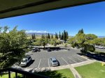 View from upper guest room lanai.  Pool is right across the parking lot.